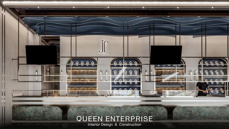 ออกแบบร้านทองยุคใหม่โทนขาวครีมทอง, ตกแต่งร้านทองสไตล์ Modern Luxury, ร้านทองดีไซน์โมเดิร์นไม่ใช้สีแดง, Queen Enterprise Construction Company, งานอินทีเรียคือสิ่งสำคัญ, สถาปนิกออกแบบภายใน, วิศวกรงานระบบ, งานฝีมือประณีตในการติดตั้งคิ้วสแตนเลส, การจัดแสงไฟขับออร่าทองคำ, ตู้โชว์ทองนิรภัยดีไซน์พรีเมียม